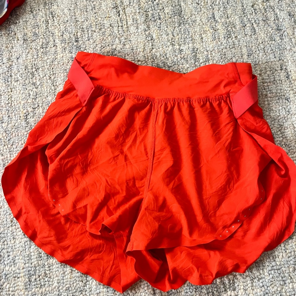 Orange lululemon fast and free shorts